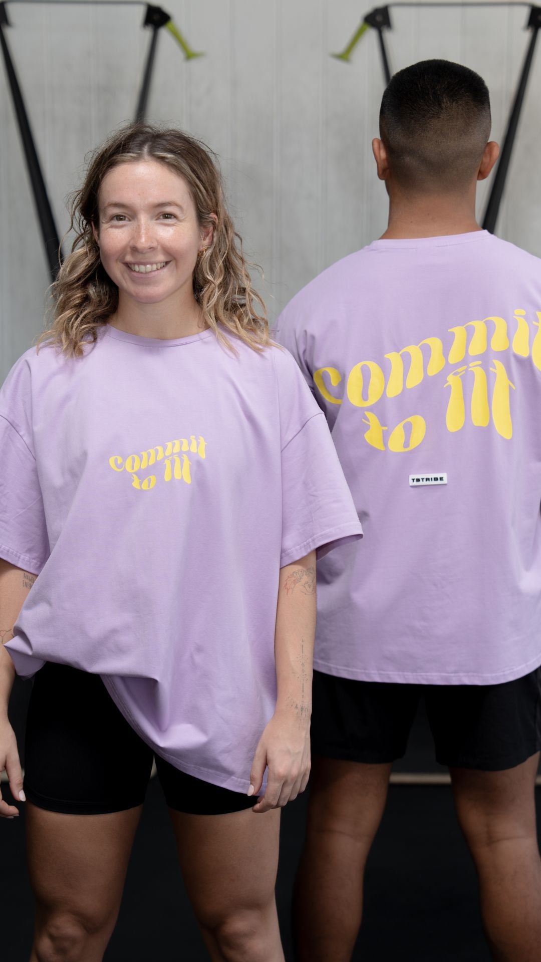 Purple graphic t shirt with yellow writing